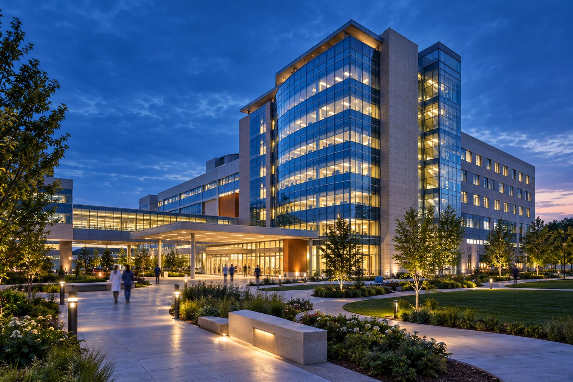 A modern hospital campus at dusk